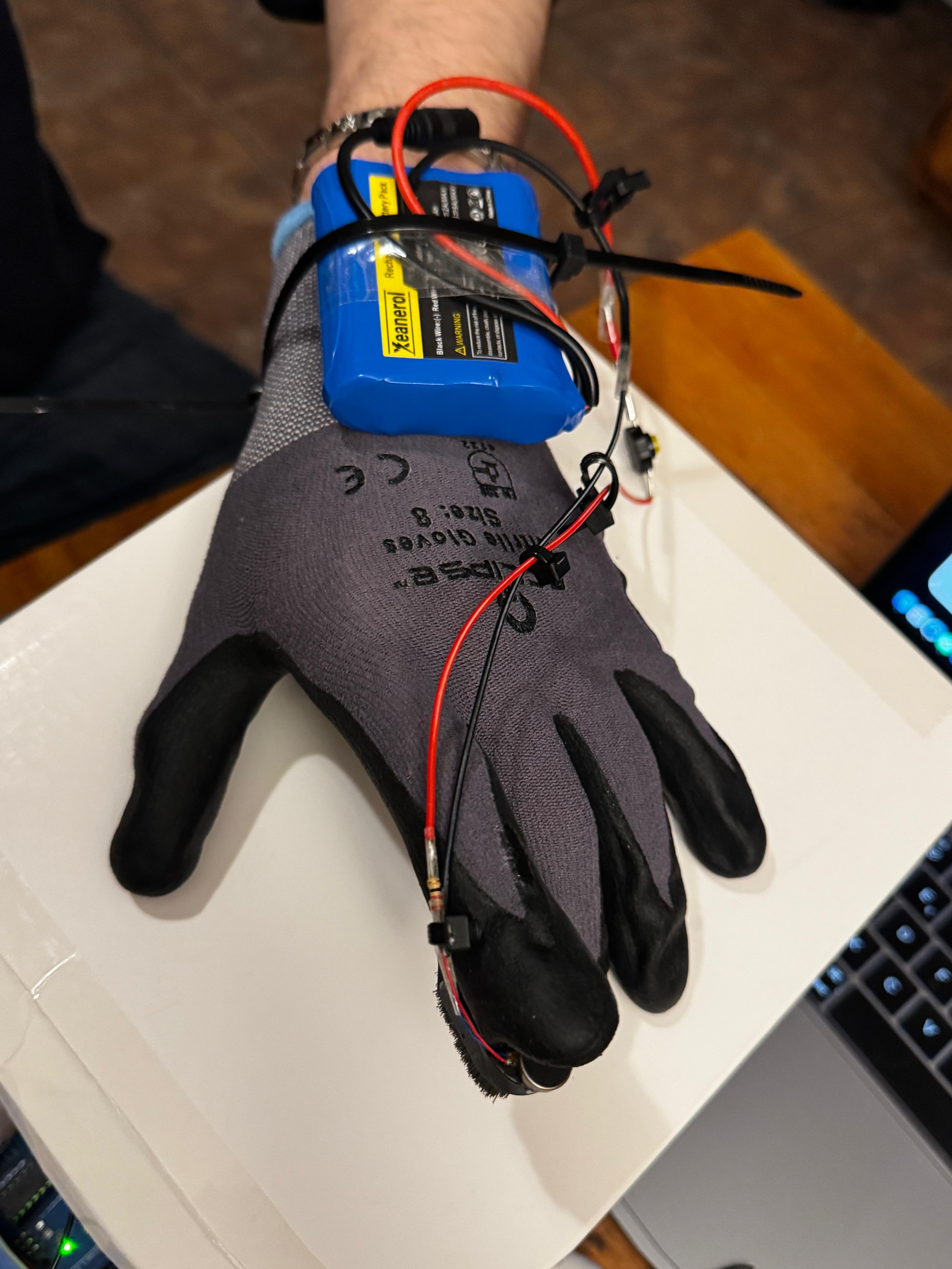 CaniBrush first working prototype — assembled ultrasonic dog toothbrush glove built by the founding team